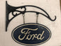 cast iron Ford sign